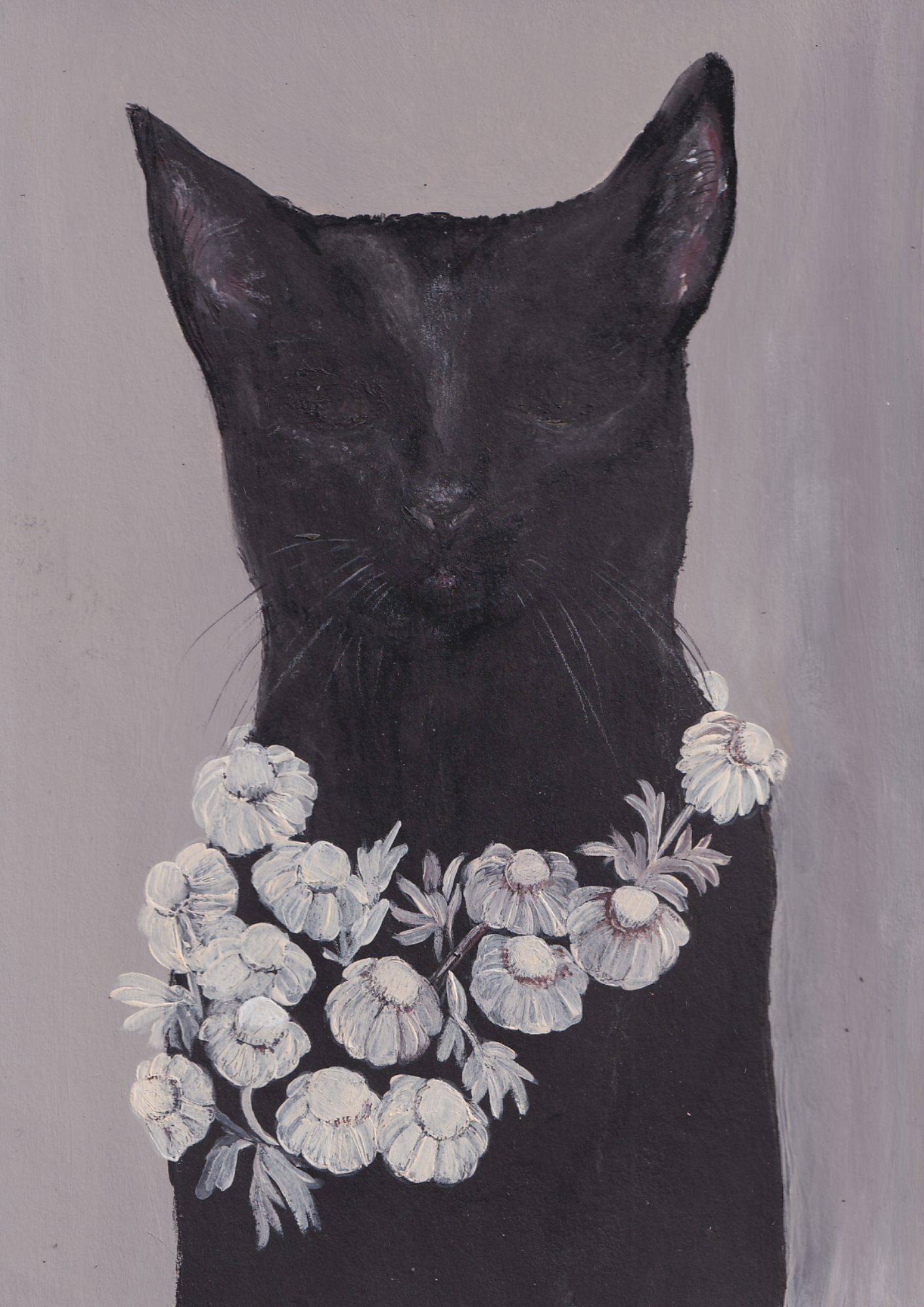 Chat noir et couronne de fleurs