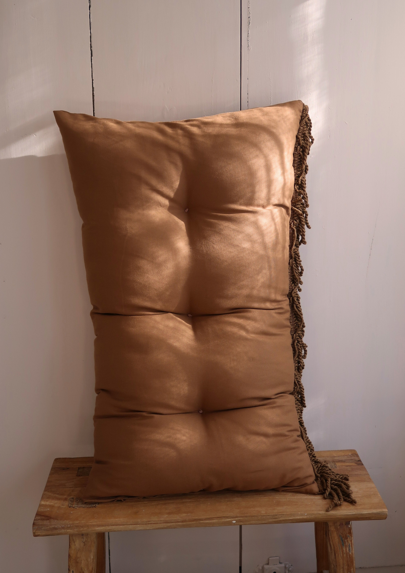 Coussin capitonné caramel 80cm