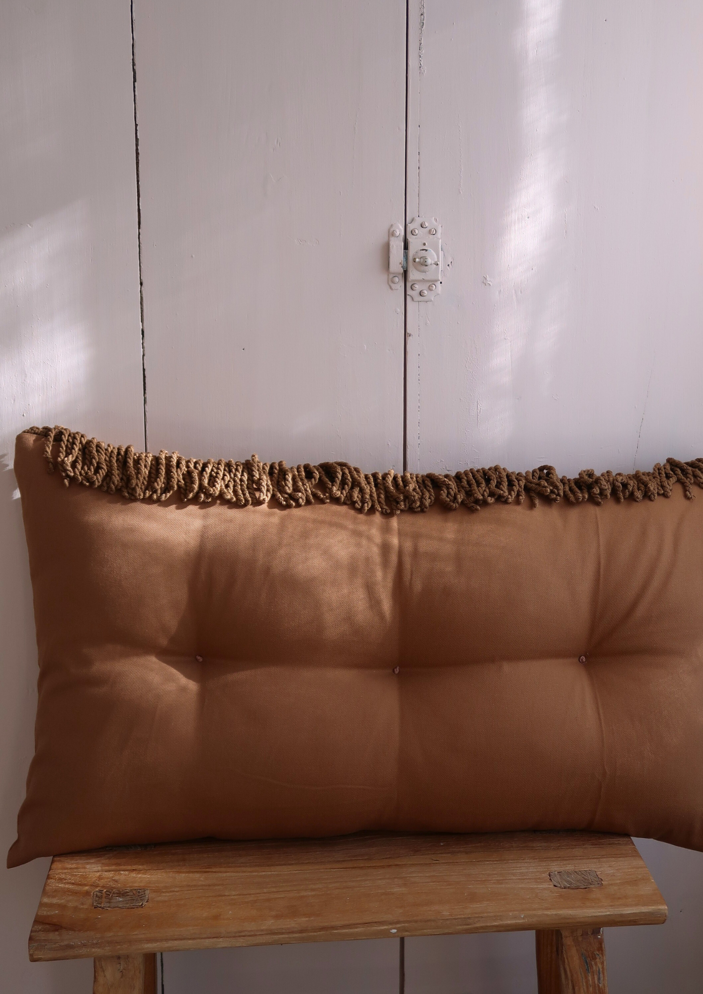 Coussin capitonné caramel 80cm