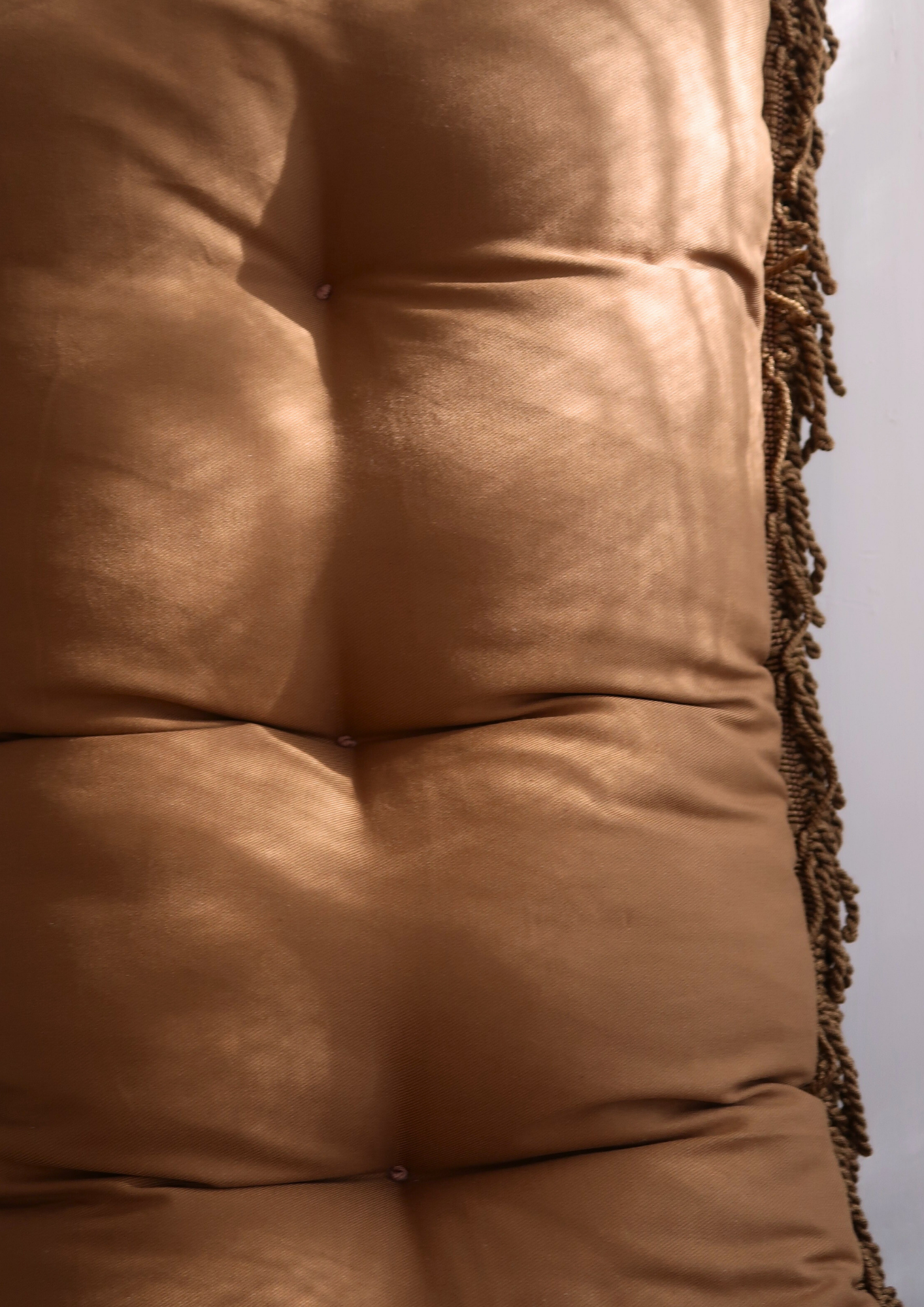 Coussin capitonné caramel 80cm