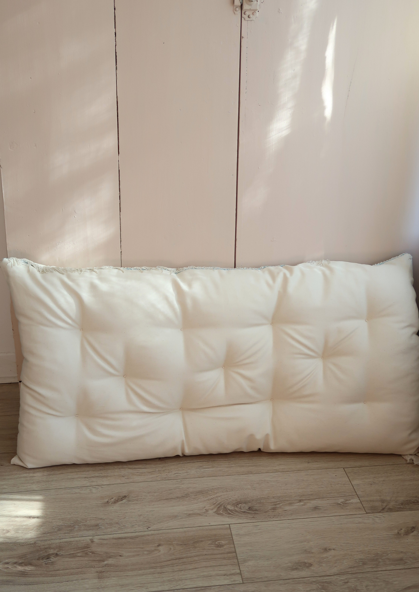 Grand coussin capitonné naturel 1m05